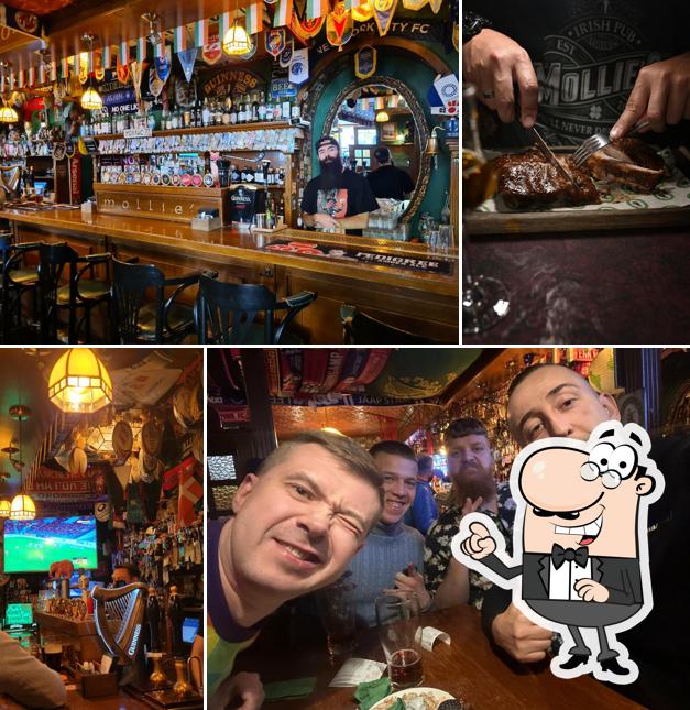 Посмотрите на внутренний интерьер "Mollie's"