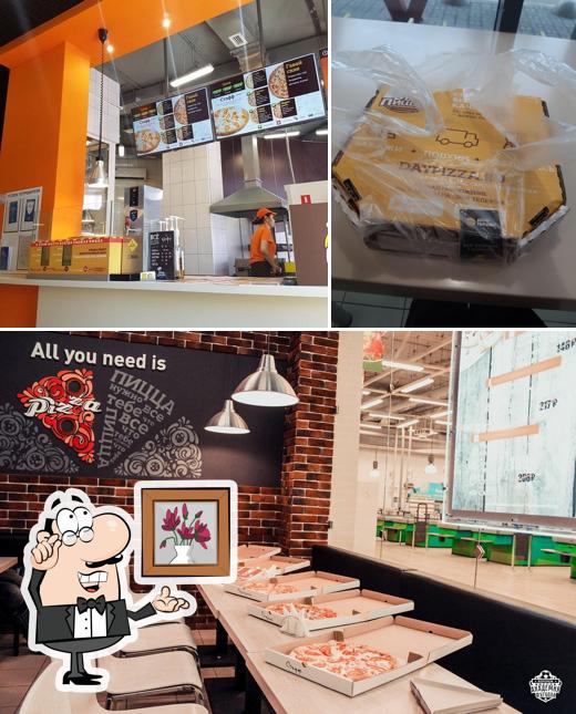 Посмотрите на внутренний интерьер "Дня пиццы"