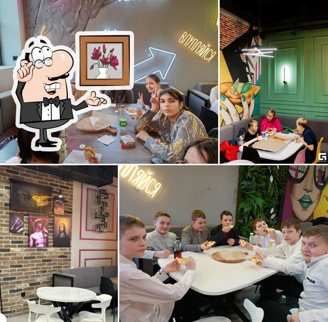 Посмотрите на внутренний интерьер "Влупицца"