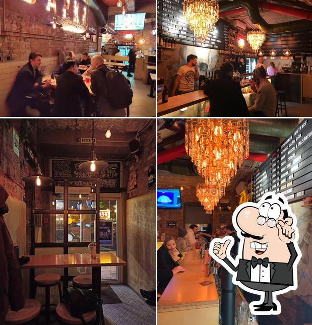 Изображение, на котором видны внутреннее оформление и барная стойка в Варка