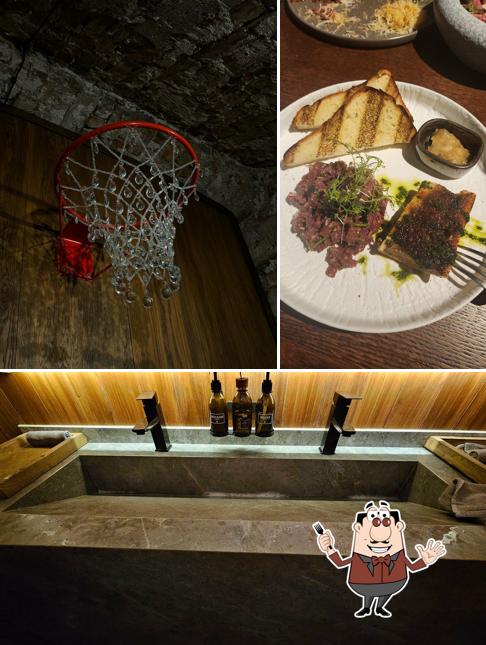 Посмотрите на это изображение, где видны еда и напитки в Meat Happens BBQ