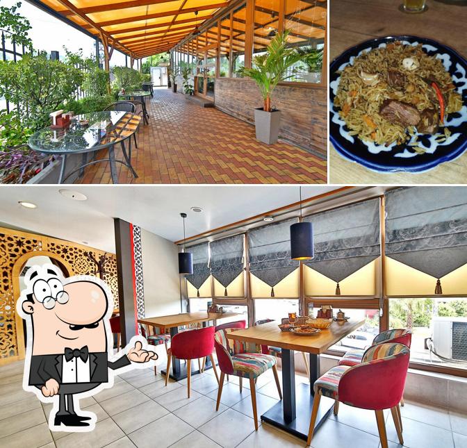 Фото, на котором видны внутреннее оформление и напитки в Ташкент