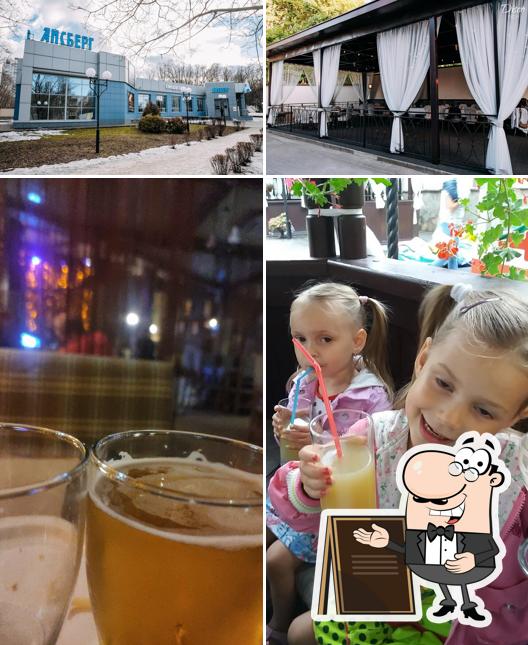 Взгляните на это изображение, где видны внешнее оформление и напитки в Айсберг