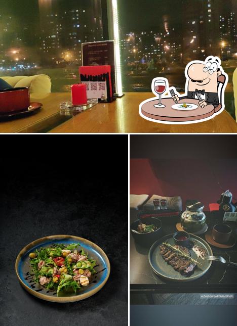 Посмотрите на это фото, где видны еда и столики в Эйфория