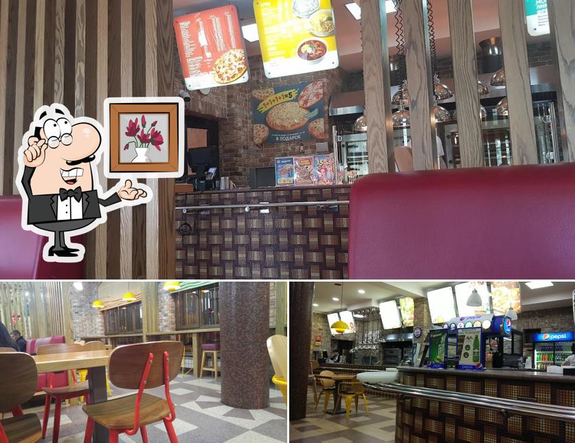 Посмотрите на внутренний интерьер "Дара Пиццы"