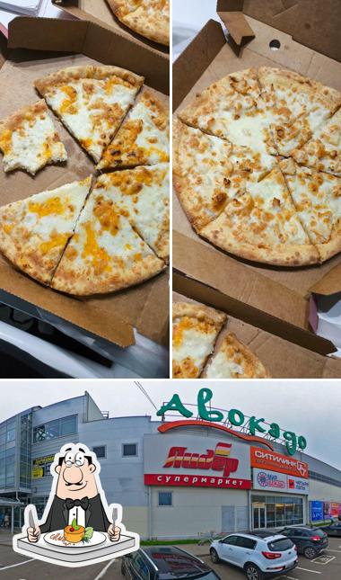 Фотография, на которой видны еда и внешнее оформление в Додо Пицца