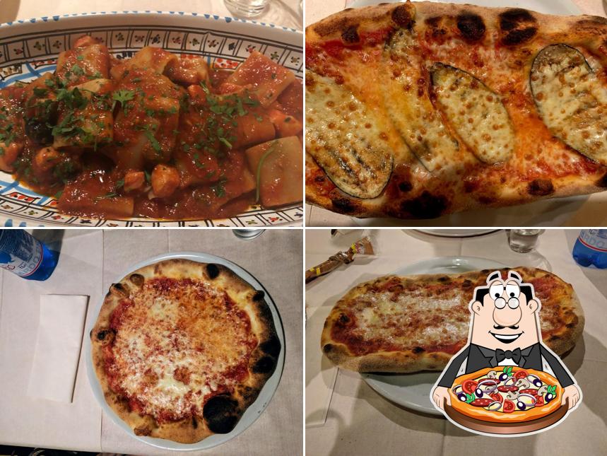 Trattoria Figaro cucina con pizza