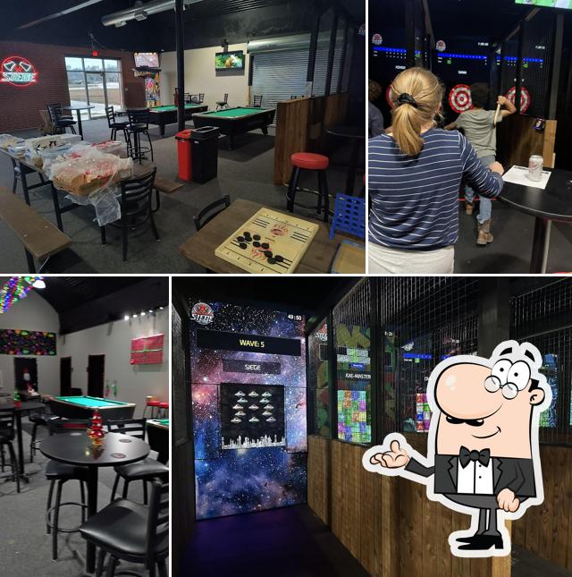 Siege — Axe Throwing, Pool, Golf & Racing Sim, Team Building