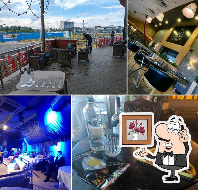 Посмотрите на внутренний интерьер "Wood & Fire RESTAURANT"