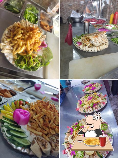 مطعم وشاورما المنهل