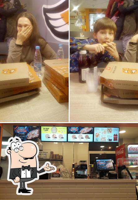 Посмотрите на внутренний интерьер "Додо Пицца"