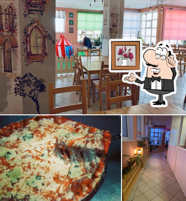 Это фотография, где изображены внутреннее оформление и пицца в Cosa Nostra