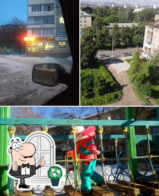 Это фотография, где изображены внешнее оформление и игровая площадка в Империя Суши