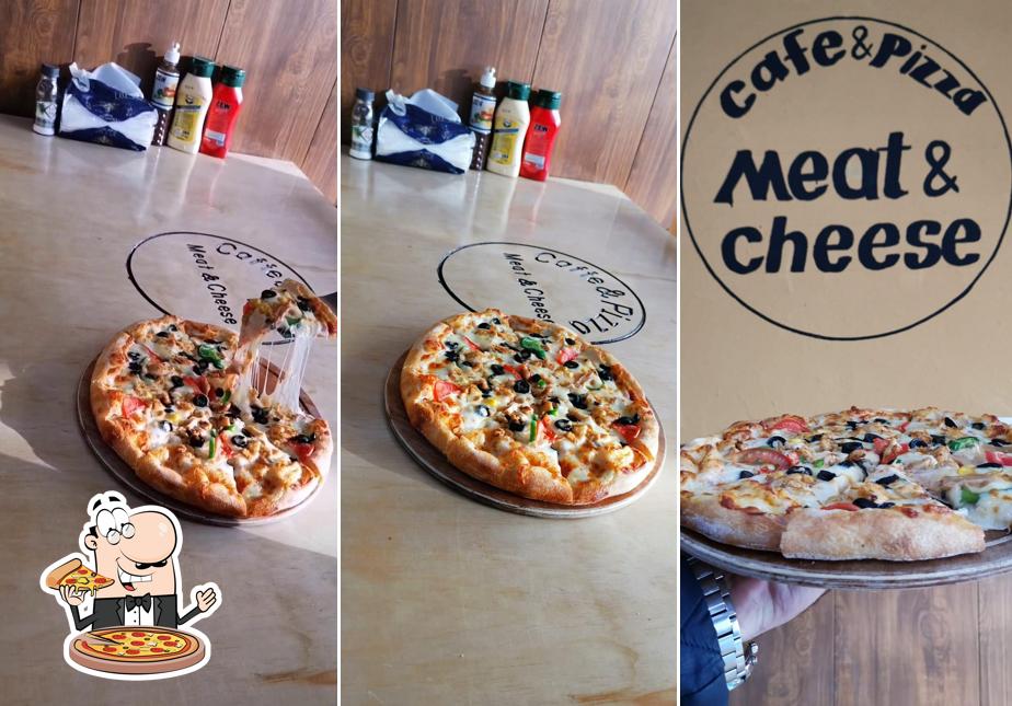 Meat & cheese pizza and caffe