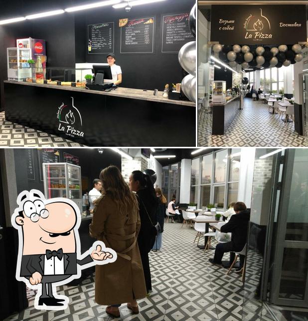 Посмотрите на внутренний интерьер "Pizzeria La Pizza"
