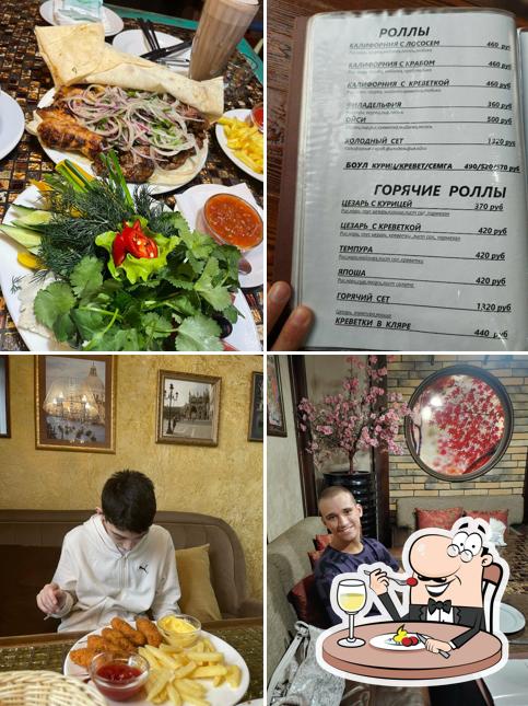 Фотография, на которой видны еда и внутреннее оформление в Pizza Ха