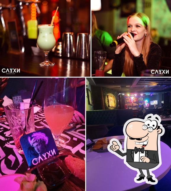 Посмотрите на этот снимок, где видны внутреннее оформление и напитки в Слухи