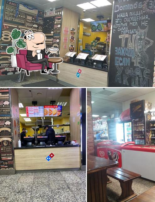 Посмотрите на внутренний интерьер "Домино'са Пицца"