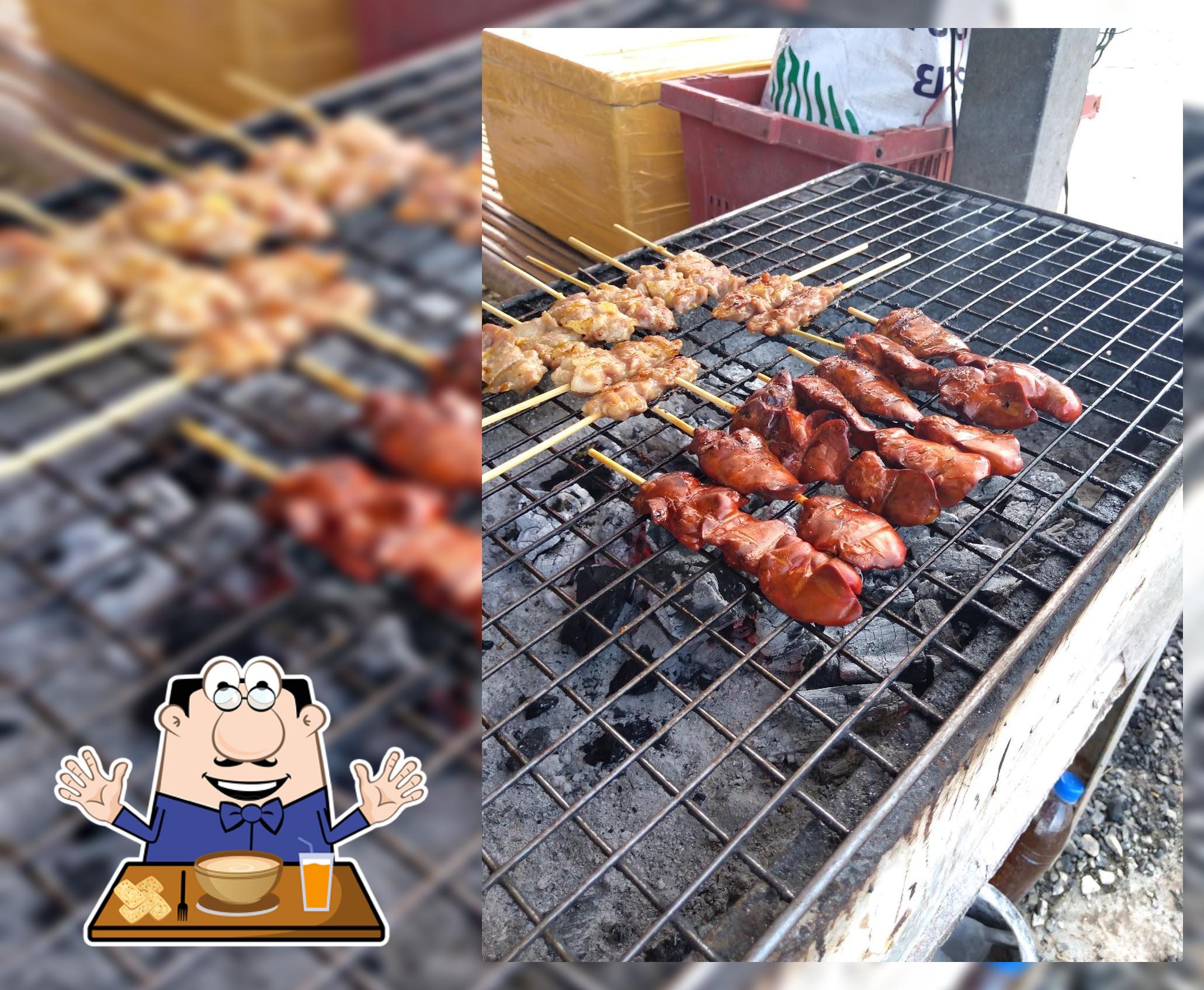 ตาตั้มหมูปิ้งนมสดตลาดนัดวังแซ้ม
