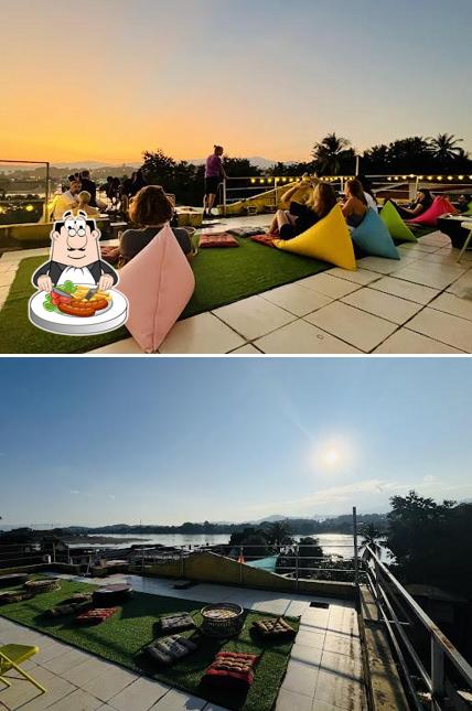 Sunset on the roof with a cocktail