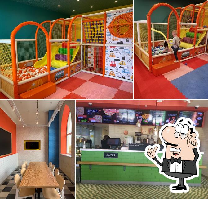 Посмотрите на внутренний интерьер "Лола Пицца"