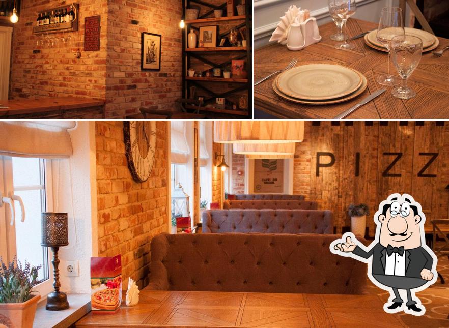 Снимок, на котором видны внутреннее оформление и еда в Кафе Сицилия