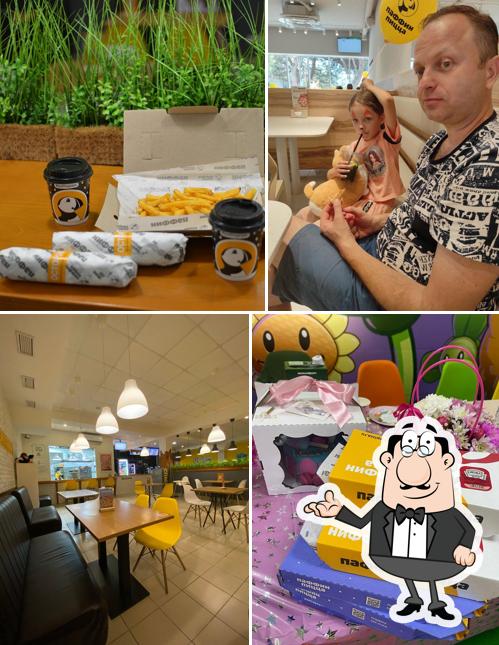 Посмотрите на внутренний интерьер "Паффина Пиццы"