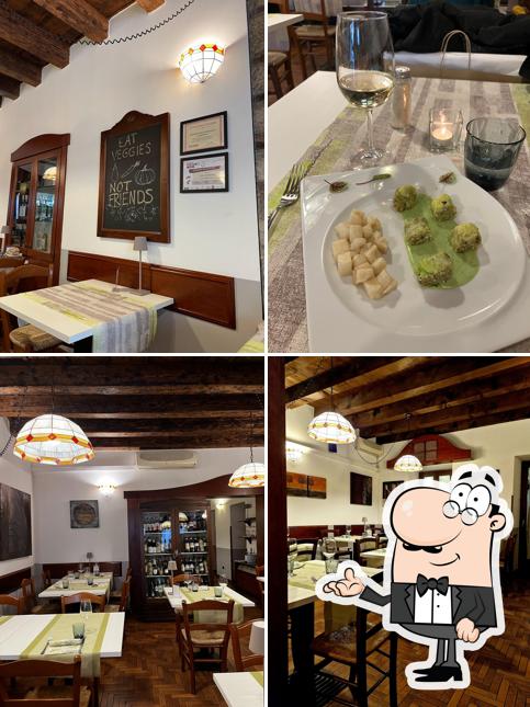 Посмотрите на внутренний интерьер "Ristorante Vegano Biologico La Lanterna"