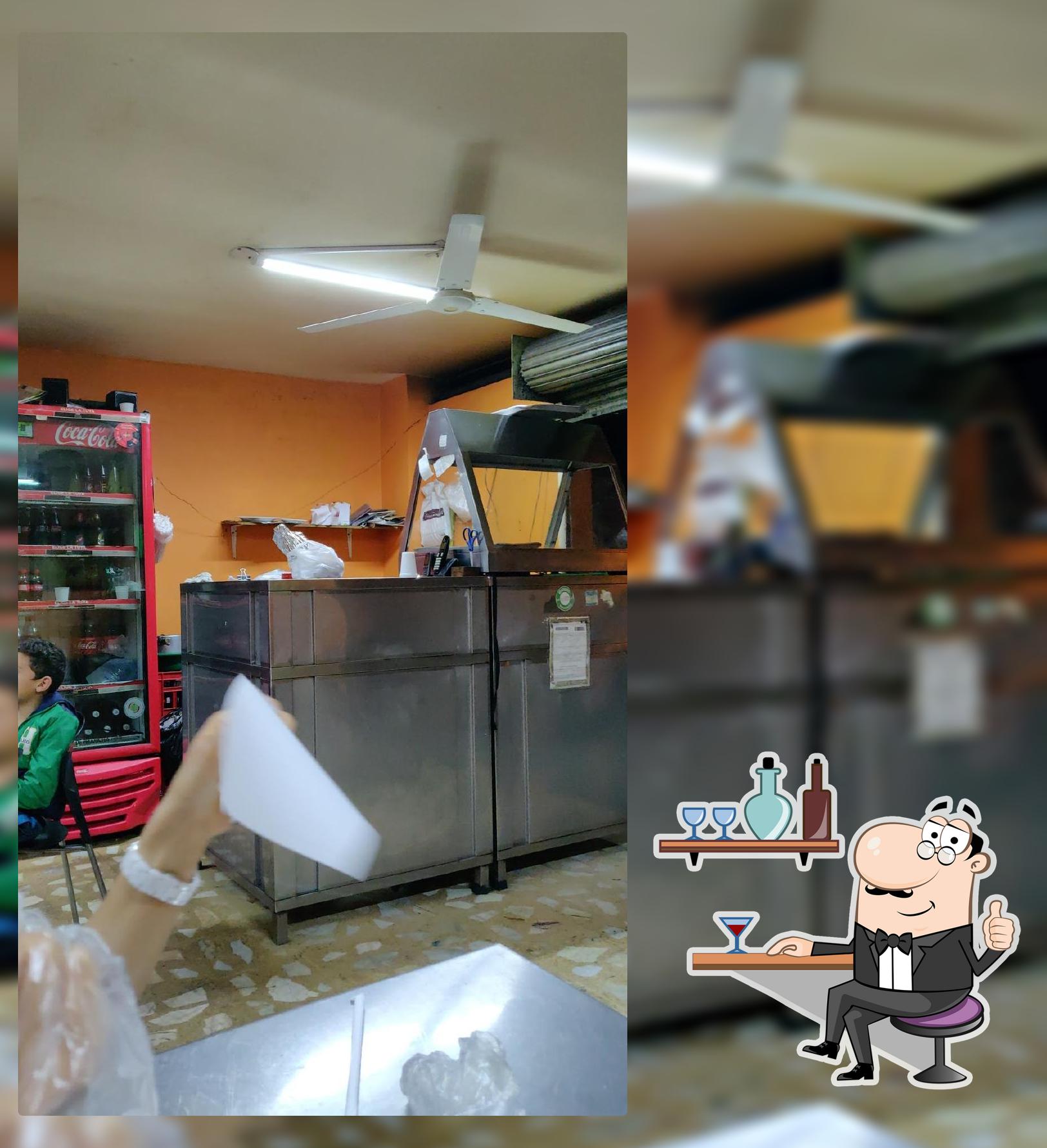 Pollos al carbón El Caleñito