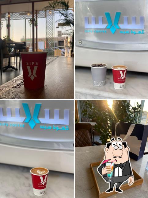 sips coffee