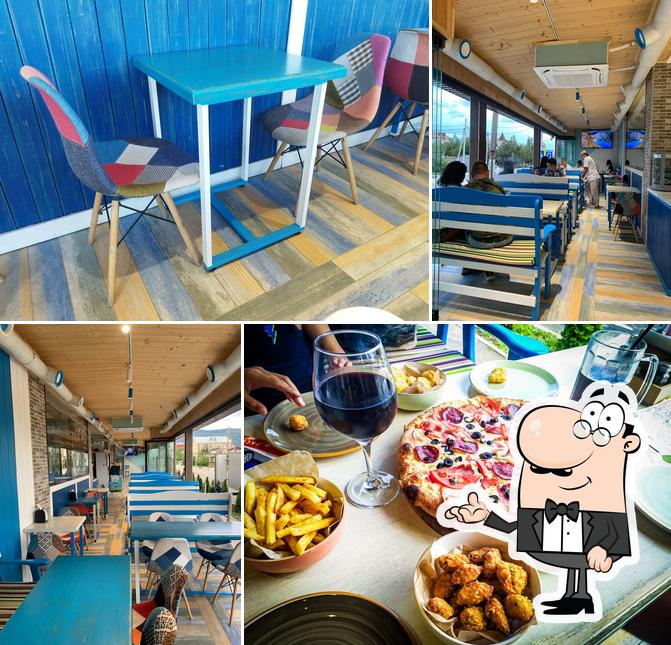 Посмотрите на внутренний интерьер "У Грека"