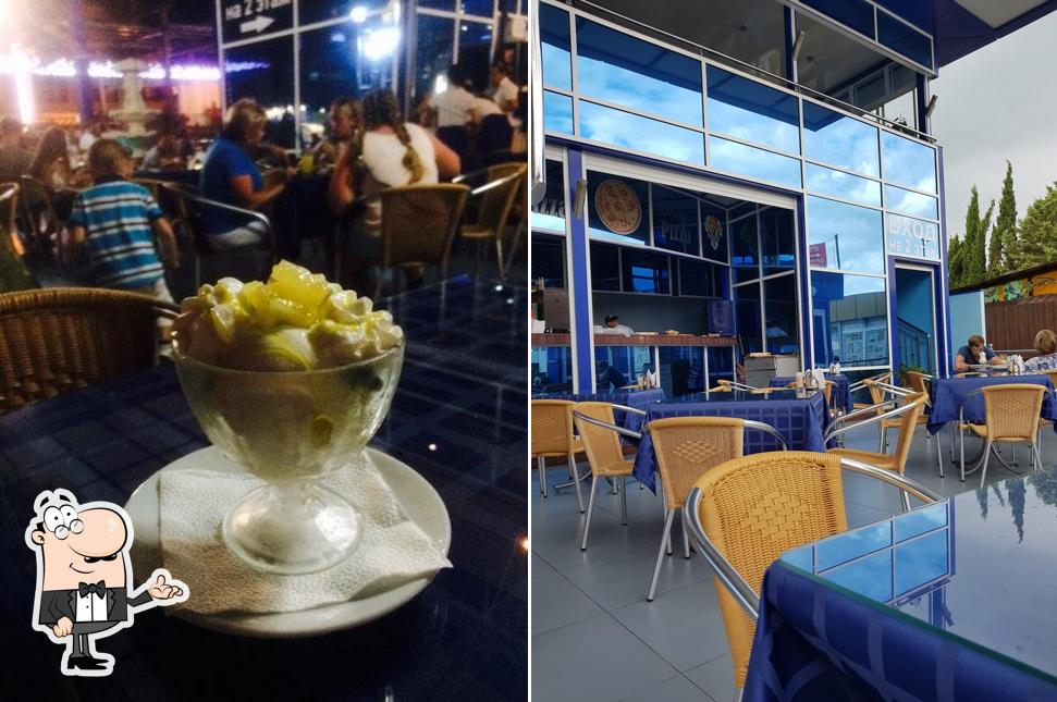 Посмотрите на внутренний интерьер "Гранда Пицца"