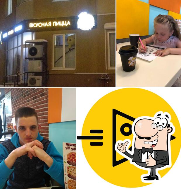 Взгляните на изображение ресторана "День пиццы"