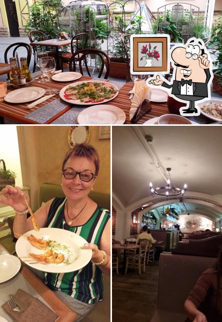 Посмотрите на внутренний интерьер "Траттории Венеция"