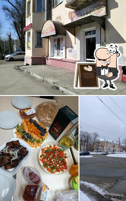 У камина