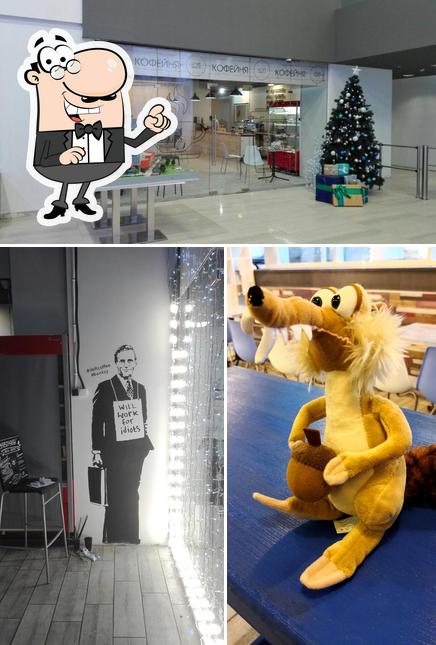 Посмотрите на внутренний интерьер "Loft Кофейни"