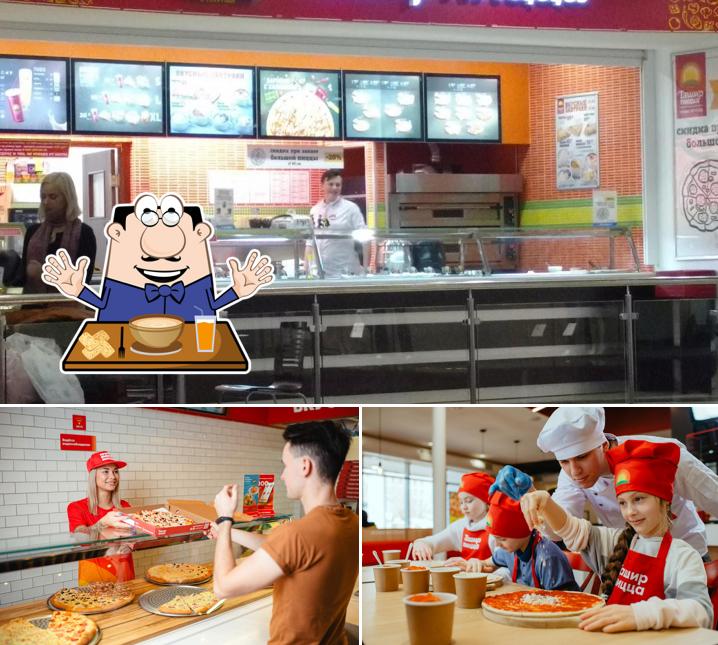 Фотография, на которой видны еда и внешнее оформление в Ташир Пицца