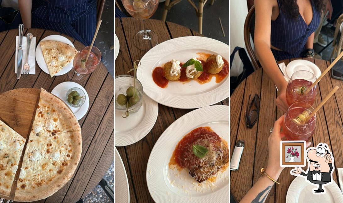 Посмотрите на внутренний интерьер "Osteria by Mandy's"