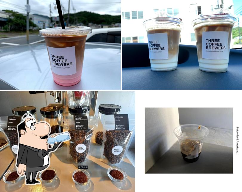 three coffee brewers