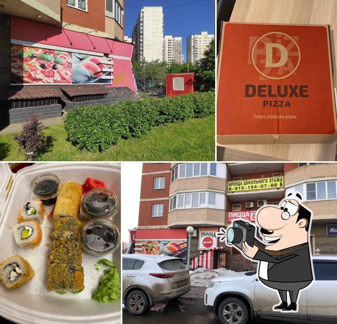 Это снимок ресторана "Пицца Делюкс"