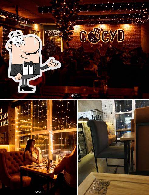 Это снимок, где изображены внутреннее оформление и барная стойка в Сосуд