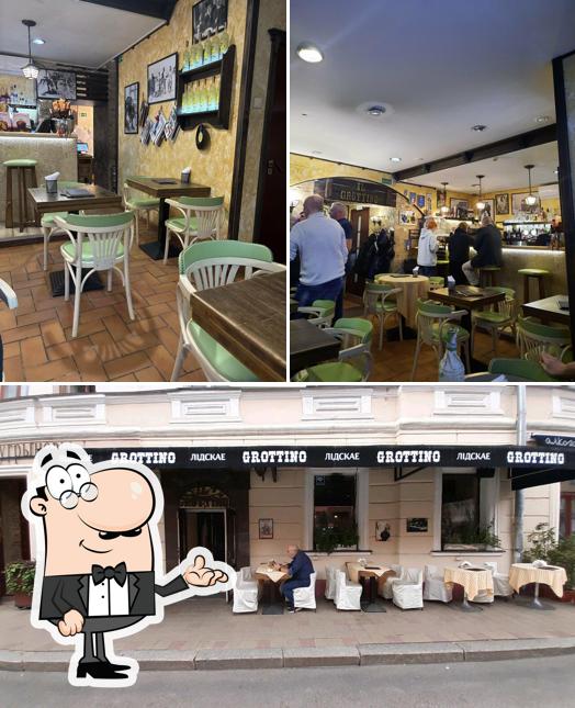 Посмотрите на внутренний интерьер "Il Grottino"