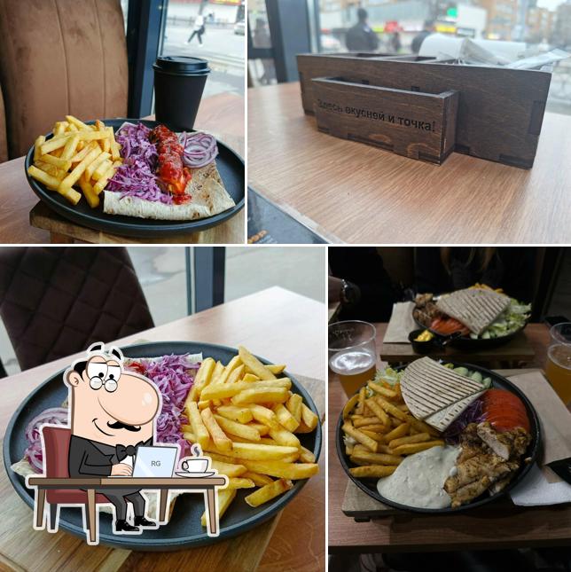 Это фотография, где изображены внутреннее оформление и еда в Smoky Grill