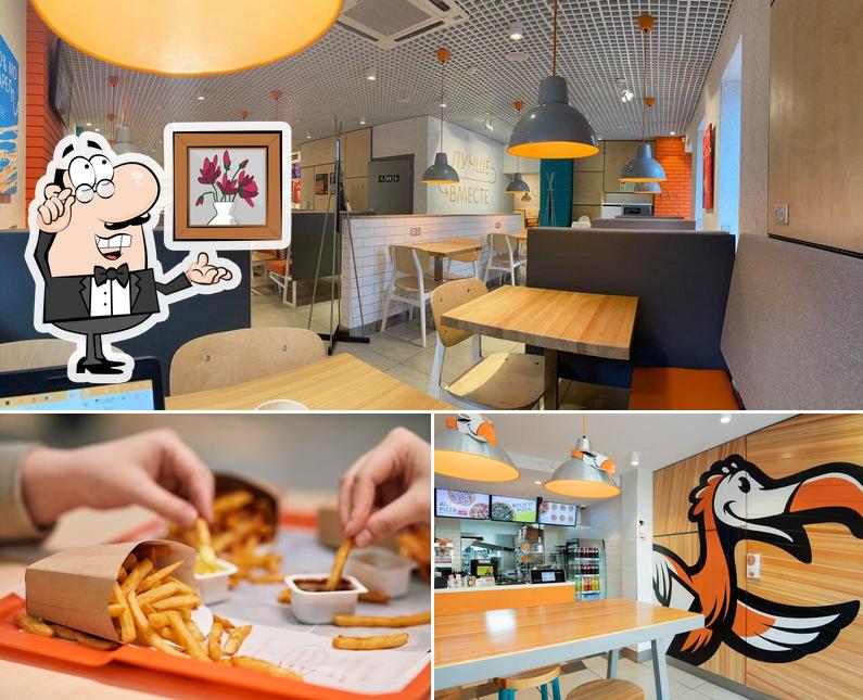 Фотография, на которой видны внутреннее оформление и картофель фри в Додо Пицца