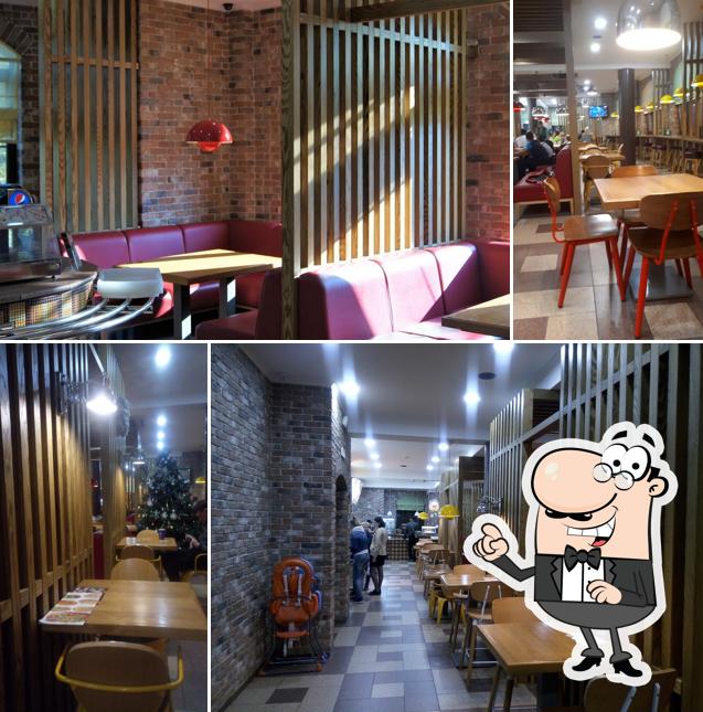 Посмотрите на внутренний интерьер "Дара Пиццы"