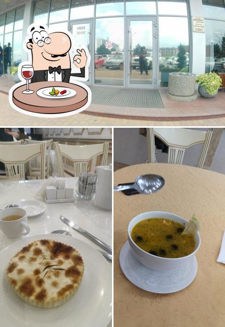 Фото, на котором видны еда и внешнее оформление в Деликат