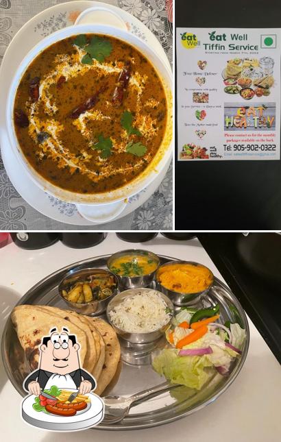 EAT WELL TIFFIN SERVICE & Restaurant IN HAMILTON ONTARIO..TAKEAWAY ....CATERING." ..