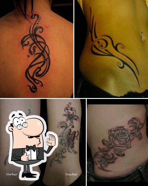 Snake Bite Tattoo