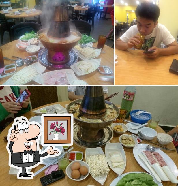 奇香铜碳鱼头火锅 Qi Xiang Fish Head Steamboat