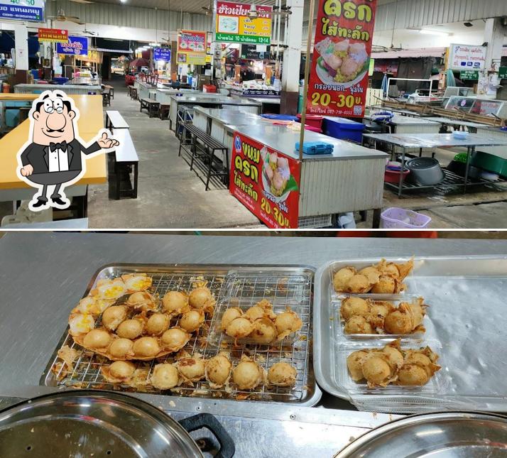 นายโรจน์ ขนมครกไส้ทะลัก